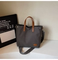 Dark grey canvas tote bag with brown leather handles and adjustable shoulder strap - Dark Tea Brown (No Charm)