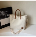 Chic cream canvas tote bag with brown leather handles and adjustable shoulder strap - White Without Pendant
