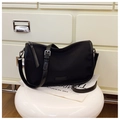 Minimalist black nylon crossbody bag with adjustable strap and silver metal zipper - Black