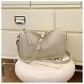 Beige canvas crossbody pillow bag with wide adjustable strap and silver metal hardware - Off-white
