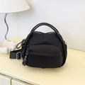 Minimalist black nylon crossbody bag with adjustable wide strap and silver hardware - Black