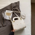 Elegant white crossbody bag with daisy embroidery and gold-tone metal hardware - White (No Pendant)