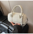 Detail of white patent leather Boston bag with vertical stitching and silver hardware - White Without Pendant