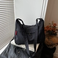 Large black nylon crossbody bag with dual ring zippers and red embroidery tag - Black