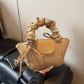 Khaki pleated handle handbag with silver magnetic buckle and side leather tassels - Brown