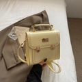 Pale yellow leather handbag with gold buckle and pearl edge detailing on soft white linen - Yellow Without Pendant