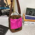 Women's trendy brown and pink contrast drawstring bucket bag with adjustable strap - Brown and Rose Red