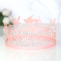 Pink laser-cut rose and bird cake border decoration on marble background - Pink