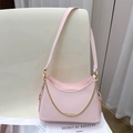 Pink patent leather hobo bag with gold chain strap and glossy mirror finish - Pink