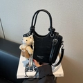 Women's black crocodile pattern bucket bag with teddy bear charm and crossbody strap - Black with Pendant