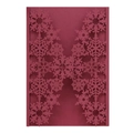 Macro detail of laser-cut snowflake patterns on dark red pearlescent cardstock invitation - Dark Red