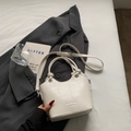 White faux leather bucket bag with crocodile pattern and adjustable crossbody strap - Rice White (No Pendant)