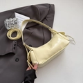 Light yellow PU leather baguette bag with side tassel detail and adjustable shoulder strap - Yellow