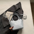 Light blue bucket bag with crocodile pattern and adjustable shoulder strap - Blue Without Charm