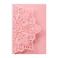 Detail of pink laser-cut invitation cover with elegant symmetric mandala pattern - Pink