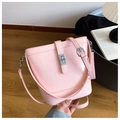 Pink crocodile pattern bucket bag with silver twist lock and adjustable shoulder strap - Pink
