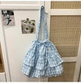Detail of blue gingham tiered tote bag with decorative drawstring bow and soft ruffles - Blue
