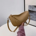 Minimalist khaki leather dumpling bag with textured surface and adjustable strap - Khaki