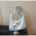 Detail of light blue checkered canvas hobo bag with cute puppy plush charm and beads - Blue with Charm