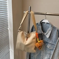 Minimalist beige canvas bucket bag with OZBG leather label and brown bear pendant - Khaki with Pendant