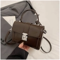 Dettaglio borsa in pelle testa di moro con chiusura girevole quadrata in argento lucido - Stile A Caffè
