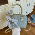 Light green woven bucket bag with lace bow, pearls and crossbody strap for summer - Green