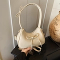 Chic cream off-white bow-decorated dumpling hobo bag with textured lychee grain finish - White