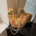 Straw weave tote bag in khaki with colorful Summer lettering and brown leather handles - Khaki