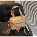 Sac à bandoulière polyvalent en toile kaki avec bandoulière réglable sur canapé vintage - Khaki