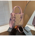 Detail of lavender bohemian crossbody bag featuring vintage floral jacquard and silver buckle - Purple