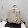 Minimalist beige nylon backpack with multi-zipper storage and adjustable straps - Off White