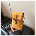 Detail of yellow pleated leather phone bag with horn buckle and contrast brown trim - Brown