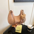 Pink crescent underarm bag with a cute plush bear charm and sleek golden logo detail - With Charm / Pink