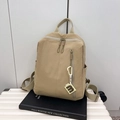 Minimalist khaki nylon backpack with large capacity and creative logo charm accessory - Khaki