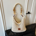 Chic cream white crochet shoulder bag with elegant wooden bead handles and woven texture - Cream White With Label