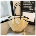 Large straw tote bag with black leather handles and white lace bow accessory - Off-white
