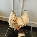Cream white crescent underarm bag with adjustable strap and cute brown teddy bear charm - With Charm / White
