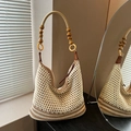 Handcrafted hollow knit tote bag in beige with brown stripes and wooden bead handle - Off-white/Khaki
