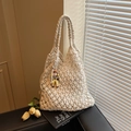 Chic beige woven cotton rope tote bag with hollow pattern and cartoon girl doll charm - Cream White With Pendant