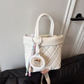 White quilted bucket bag with capybara charm and colorful woven tassel strap - White (With Pendant)