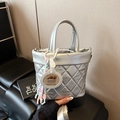 Silver quilted bucket bag with metallic finish and cute capybara charm accessory - Silver (With Pendant)