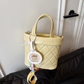 Quilted yellow bucket bag with a wide shoulder strap and cute capybara charm accessory - Yellow (With Pendant)