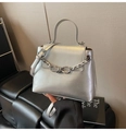 Detail of silver metallic shoulder bag with knot chain and elegant branded logo - Silver