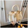 White vintage crossbody handbag with leather texture and pearl heart lace bow charm - Off White