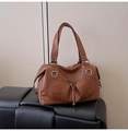 Dark brown faux leather tote bag with large metal eyelet and dual handles - Brown