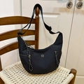 Black nylon hobo crossbody bag with adjustable wide strap and metallic M logo - Black