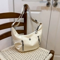 Minimalist ivory crescent dumpling bag with nylon fabric and adjustable wide strap - Off White