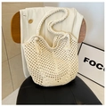 Handmade crochet shoulder bag in creamy white with hollow knit pattern and tassels - Off-white