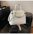White glossy patent leather crossbody bag with knot chain detail and Clearok logo - White