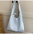 Blue and white striped nylon crescent bag with textured fabric and wide shoulder strap - Blue